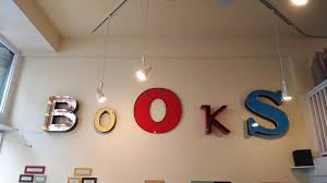 Books sign in Lucys